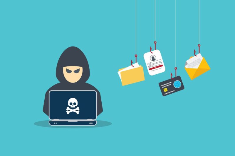 Hacker with laptop computer stealing confidential data, personal information and credit card detail. Hacking concept.
